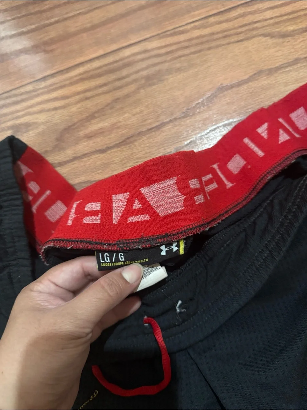 LG Black Athletic Shorts with Red Accents